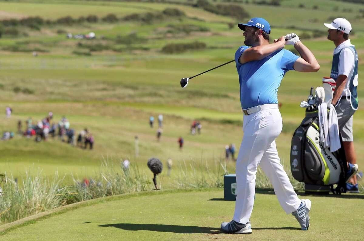Spain's Jon Rahm on the 8th tee during day three of the Irish Open at Portstewart Golf Club, Northern Ireland, Saturday July 8, 2017. The 11th ranked Rahm shot a second straight 5-under 67 at the Irish Open and moved into a share of the lead with Daniel Im in the third round on Saturday. (Niall Carson/PA via AP)