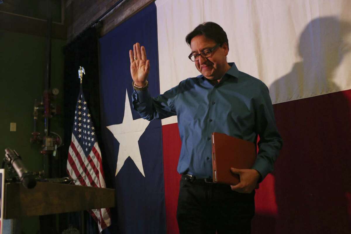 U.S. District 23 democratic candidate Pete Gallego waves as he leaves the stage after conceding the race against Republican incumbent Will Hurd, Wednesday, Nov. 9, 2016.
