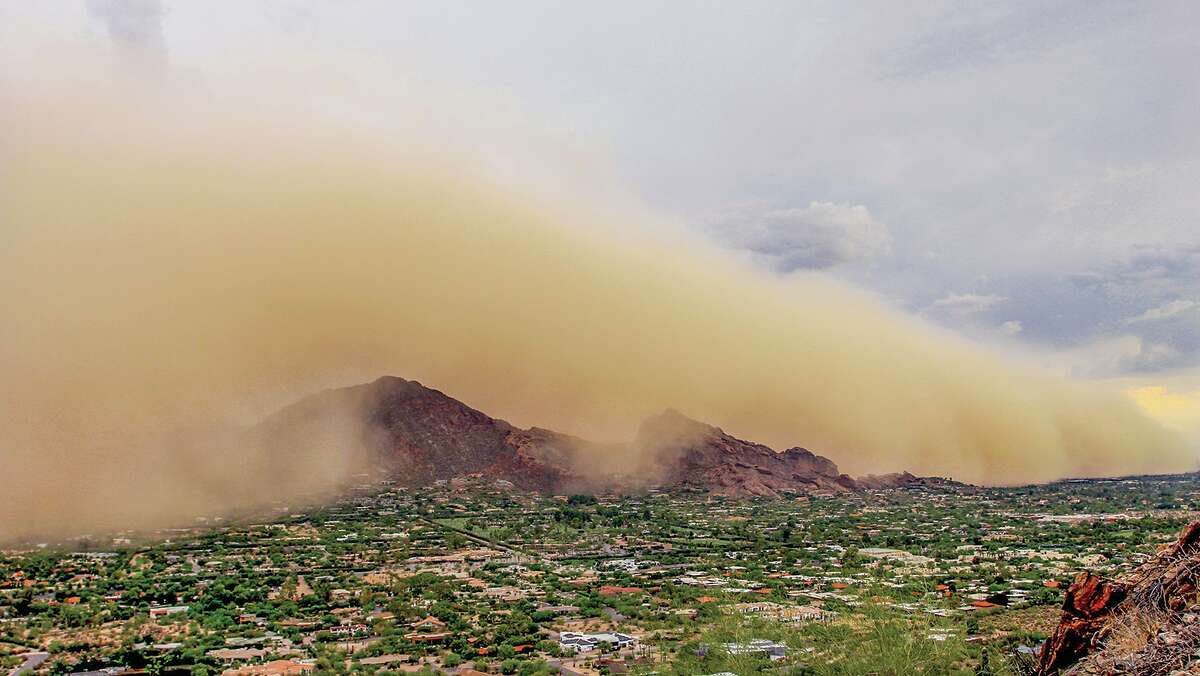Dust storms, such as this one in Arizona, can carry pathogens that can infect humans hundreds of miles from the source.