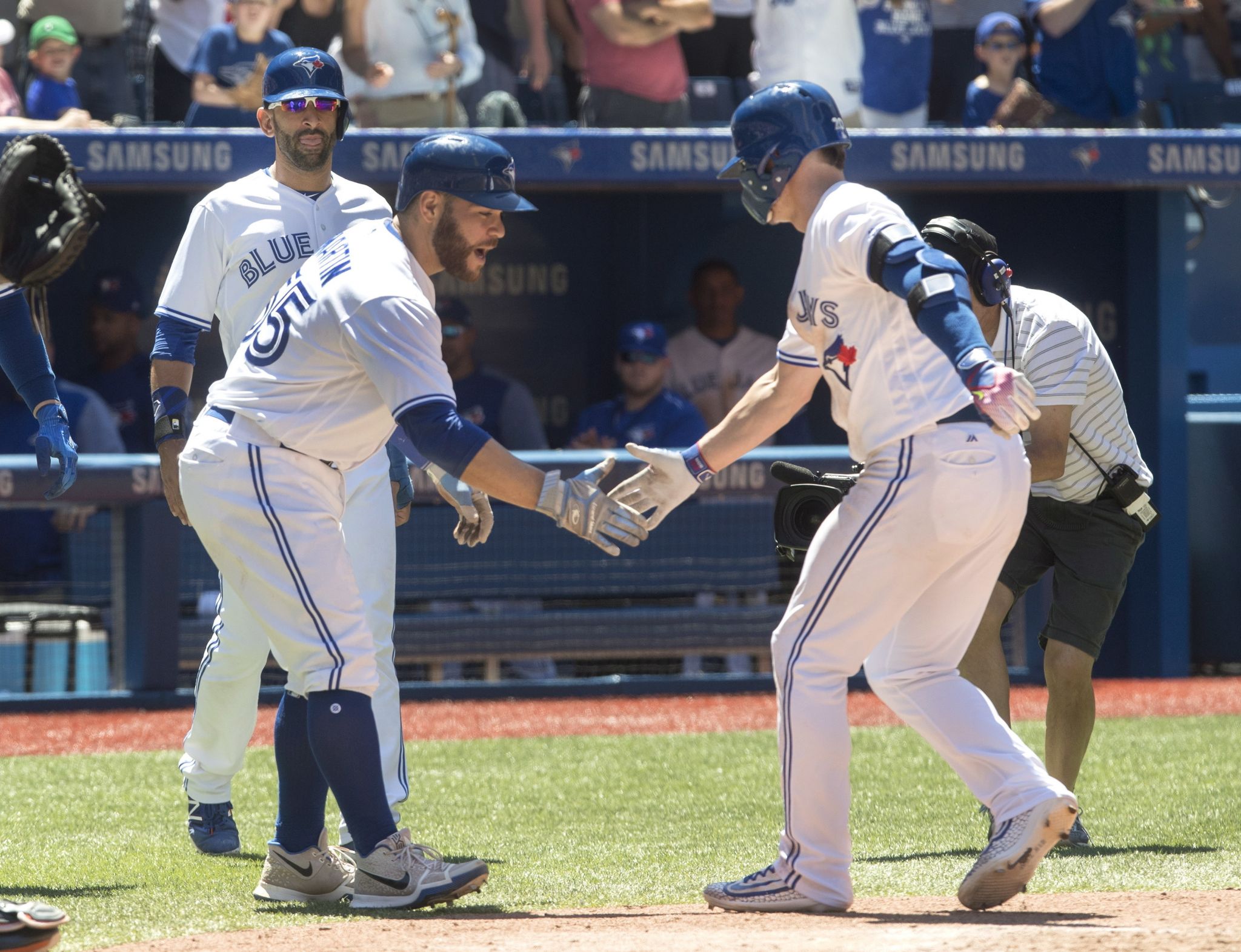 Josh Donaldson #20 of the Toronto Blue Jays reacts as he is