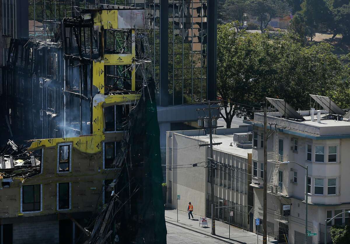 Some Residents Return To Homes Following Massive Oakland Blaze