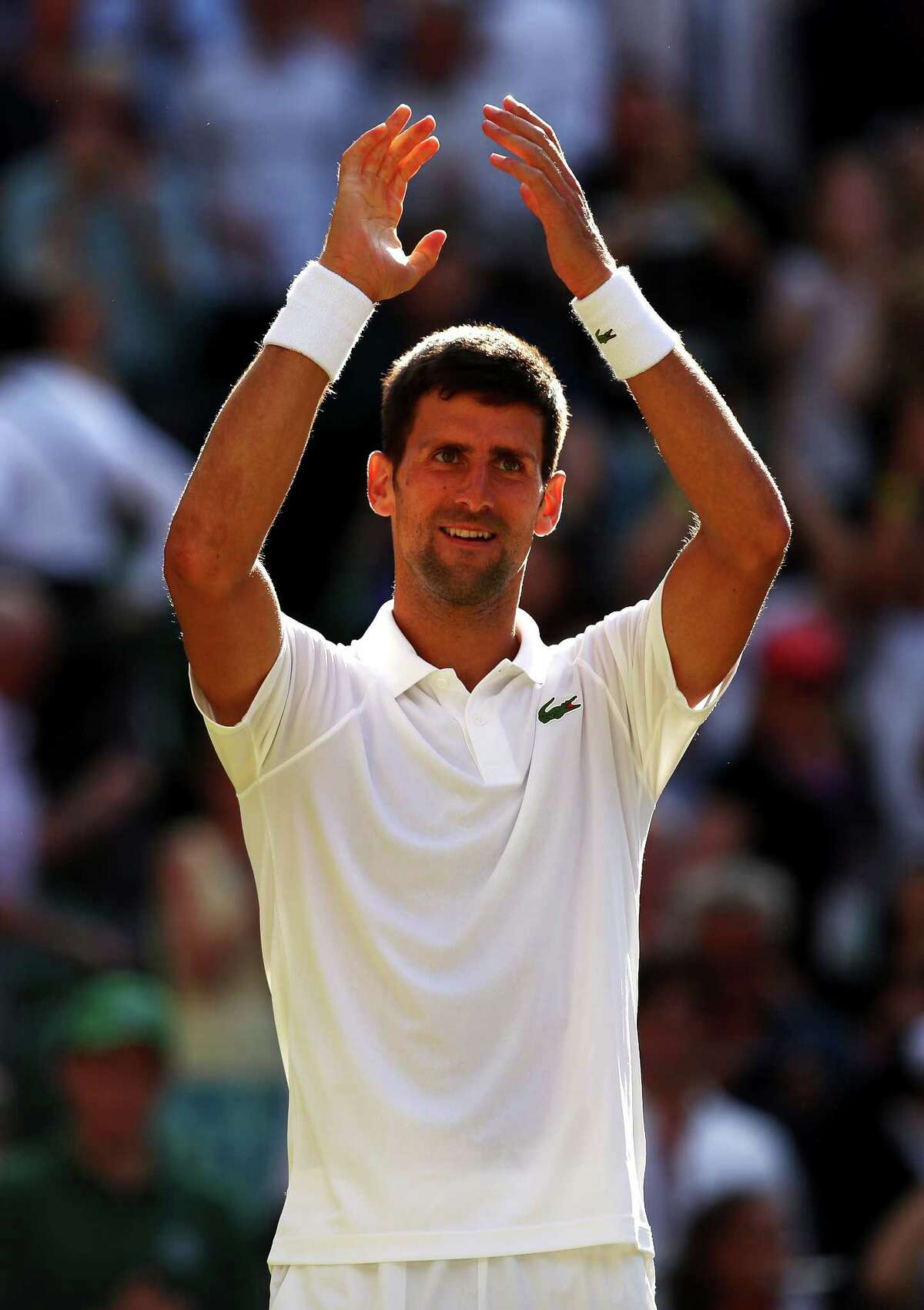 LONDON, ENGLAND - JULY 08: Novak Djokovic of Serbia celebrates victory after the Gentlemen's Singles third round match against Ernests Gulbis of Latvia on day six of the Wimbledon Lawn Tennis Championships at the All England Lawn Tennis and Croquet Club on July 8, 2017 in London, England. (Photo by Clive Brunskill/Getty Images)