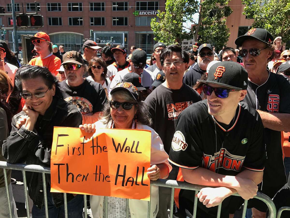 Charlene Williams holds a sign of support at Barry Bonds' induction into the Giants' wall of fame at AT&T Park in San Francisco on Saturday July 8, 2017.