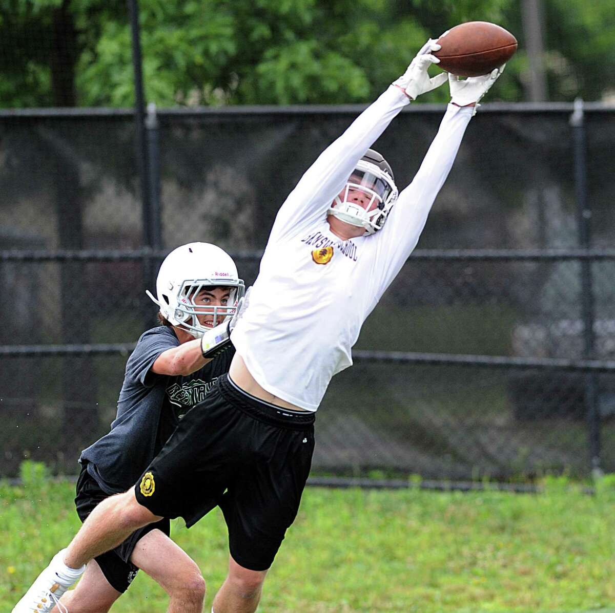 Brunswick School receiver Sean Amill makes a catch during the Grip It & Rip It football tournament at New Canaan High School, New Canaan, Conn., Saturday, July, 8, 2017.