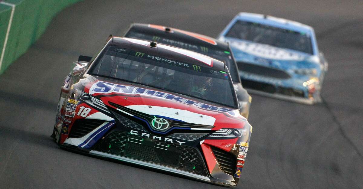 SPARTA, KY - JULY 08: Kyle Busch, driver of the #18 Snickers Toyota, leads a pack of cars during the Monster Energy NASCAR Cup Series Quaker State 400 presented by Advance Auto Parts at Kentucky Speedway on July 8, 2017 in Sparta, Kentucky. (Photo by Brian Lawdermilk/Getty Images)