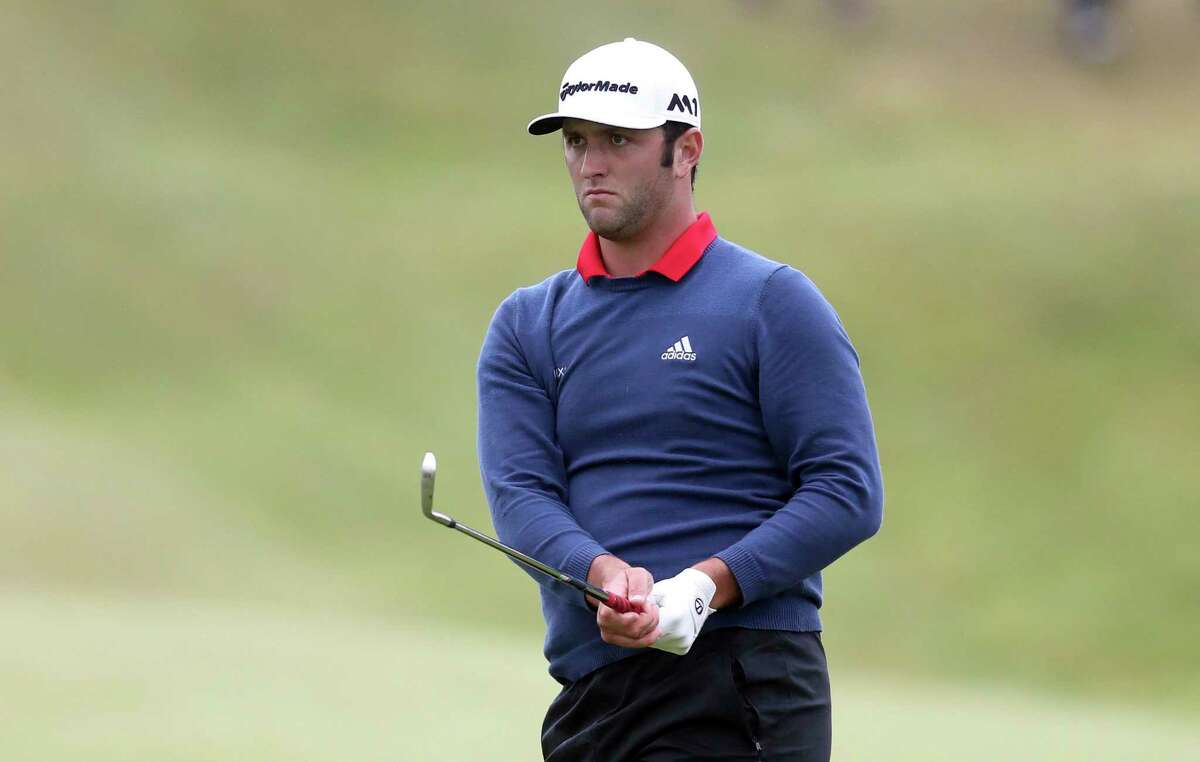 Spain's Jon Rahm during day four of the Irish Open golf tournament at Portstewart Golf Club, Northern Ireland, Sunday July 9, 2017. Rahm, one of the hottest young players in world golf, holed out from 150 yards for eagle on No. 4 and strung together four straight birdies from No. 7 to turn what was promising to be a tight final day into a procession to win the tournament Sunday. (Niall Carson(/PA via AP)