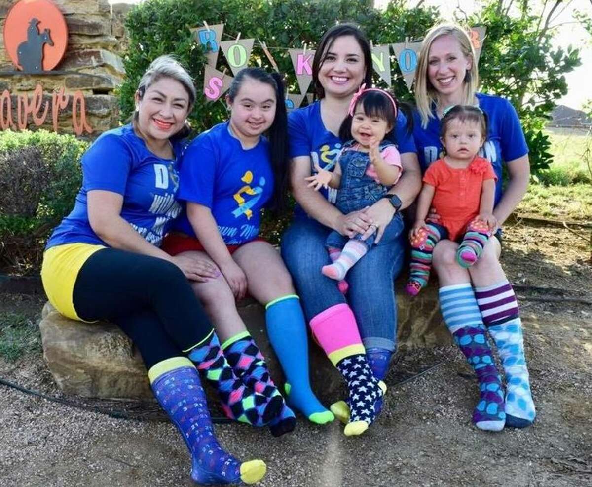 Cindy Rubio with her daughter Megan, Yazmin Charles with her daughter DanyElla and Amber Rodriguez with daughter Lila. 