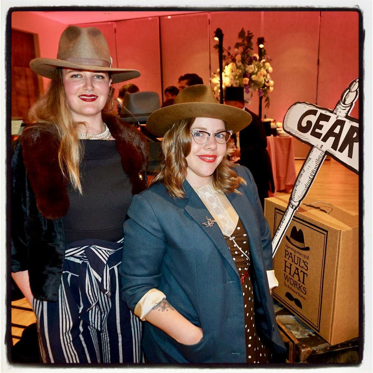 Paul's Hat Works staffers Clarkie Kabler (left) and Desiree Ammons at the Legion of Honor. June 22, 2017.