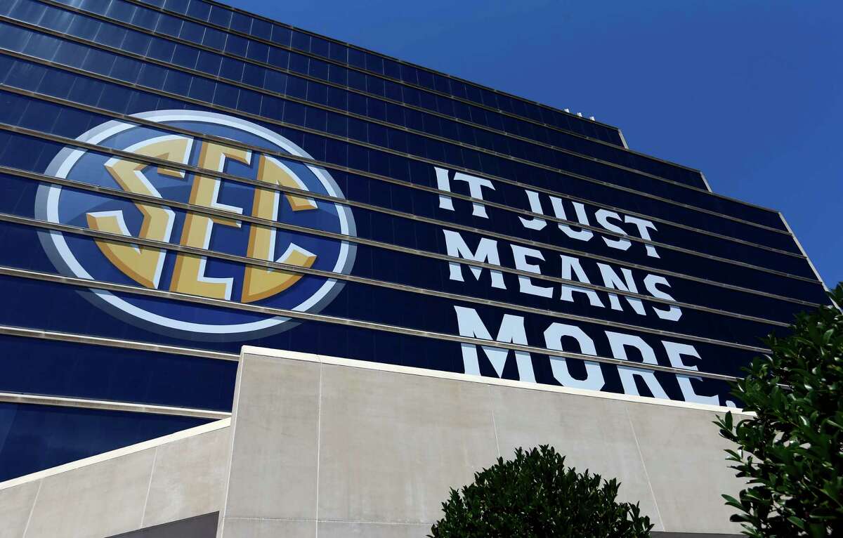 The SEC logo is shown outside of the Hyatt Regency hotel for the NCAA college football Southeastern Conference's annual media gathering, Monday, July 10, 2017, in Hoover, Ala. (AP Photo/Butch Dill)