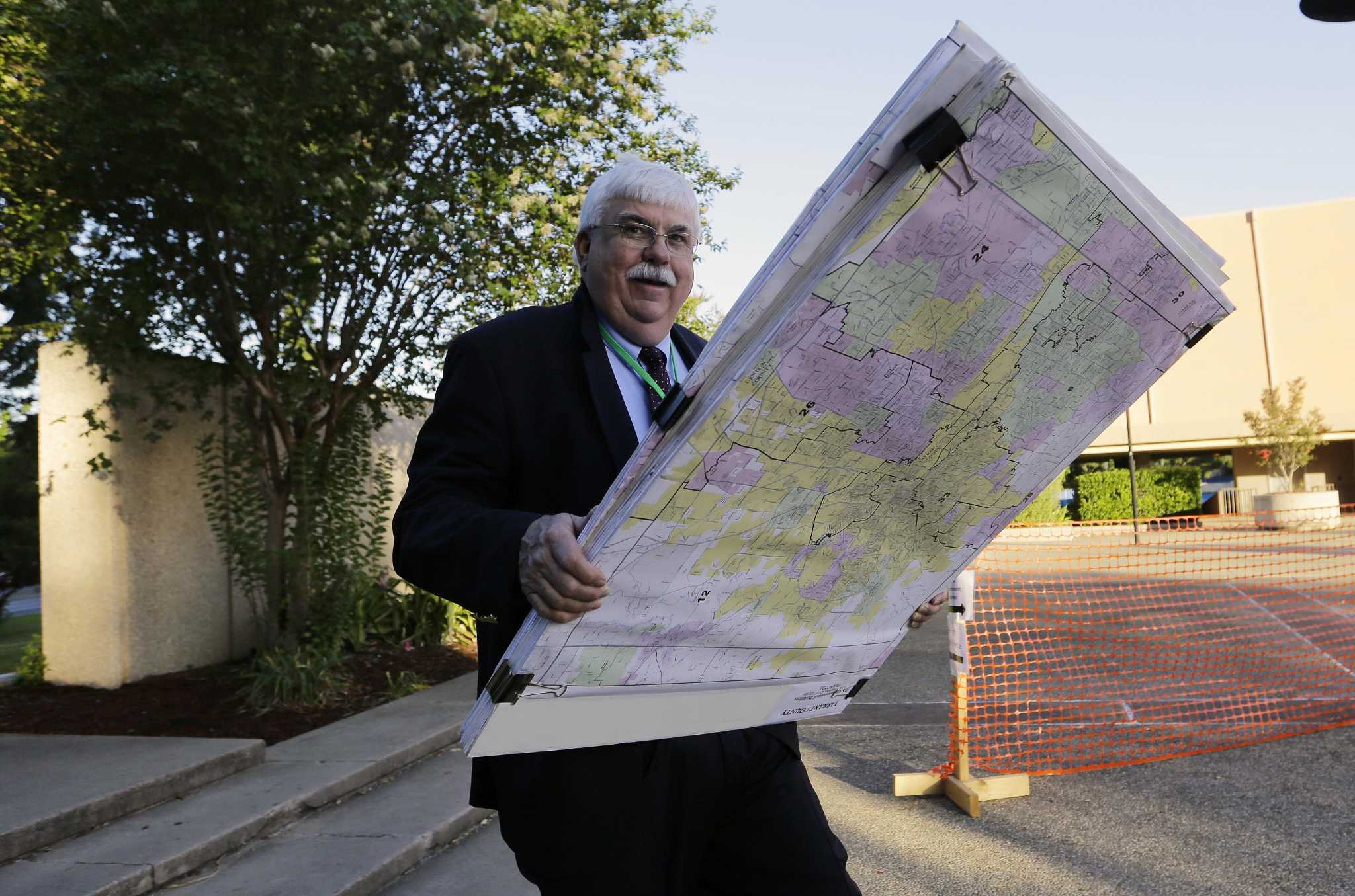First day of redistricting trial underway amid protests