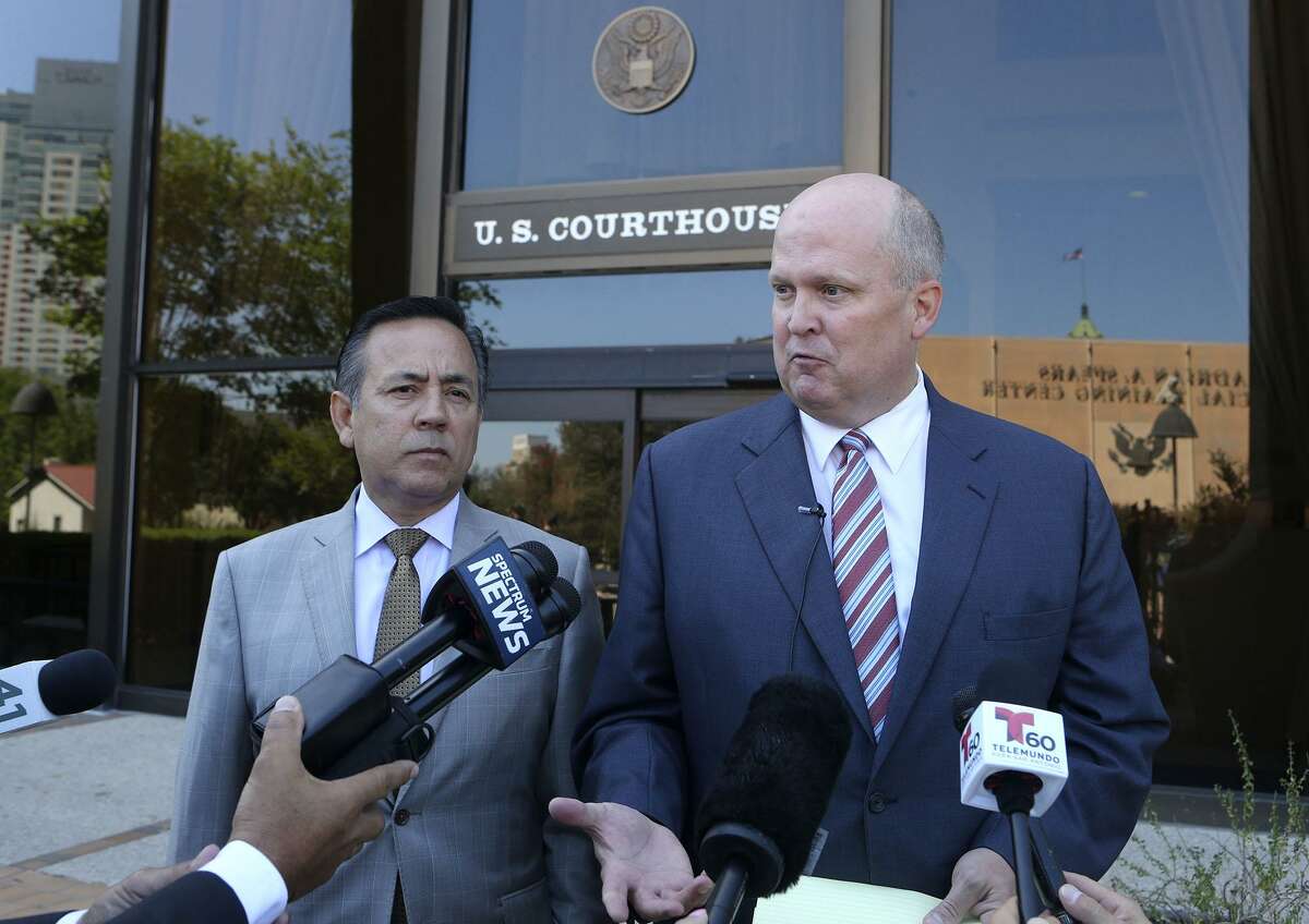 Attorney Mikal Watts (right) has been removed as counsel for state Sen. Carlos Uresti in a fraud case. A federal judge on Wednesday agreed with a prior ruling that Watts has a conflict of interest that outweighs Uresti’s right to choose his own legal counsel.