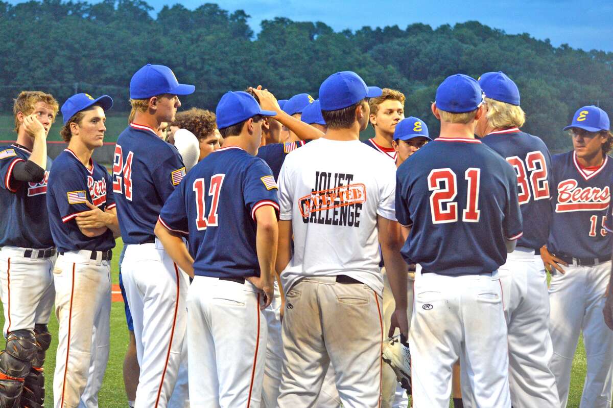 Edwardsville Bears players listen to manager Ken Schaake after a July 5 game against American National at SIUE.