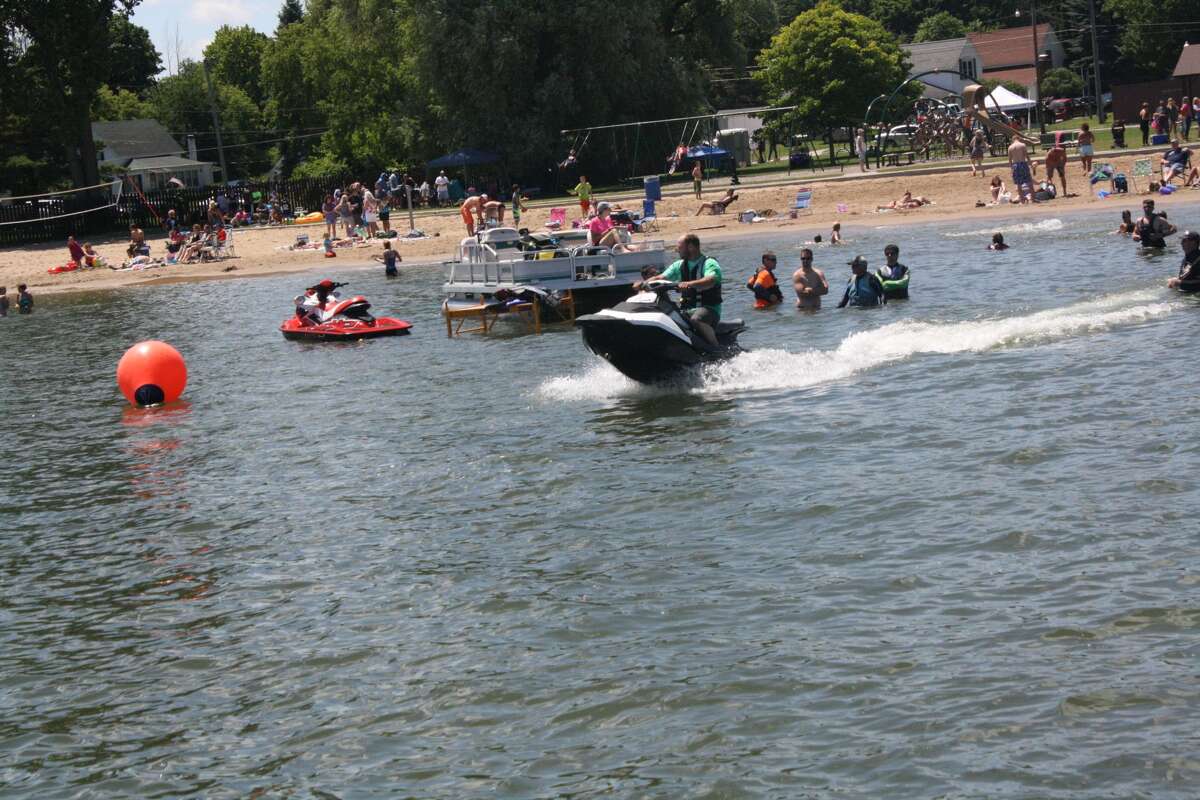 Jet skis raced through Harbor beach during the annual Maritime Festival this past weekend.