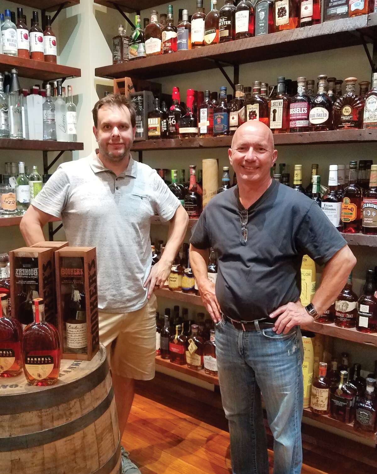 Bin 51 owners Brian Kuchta and Walter Osika in their new store in downtown Edwardsville.