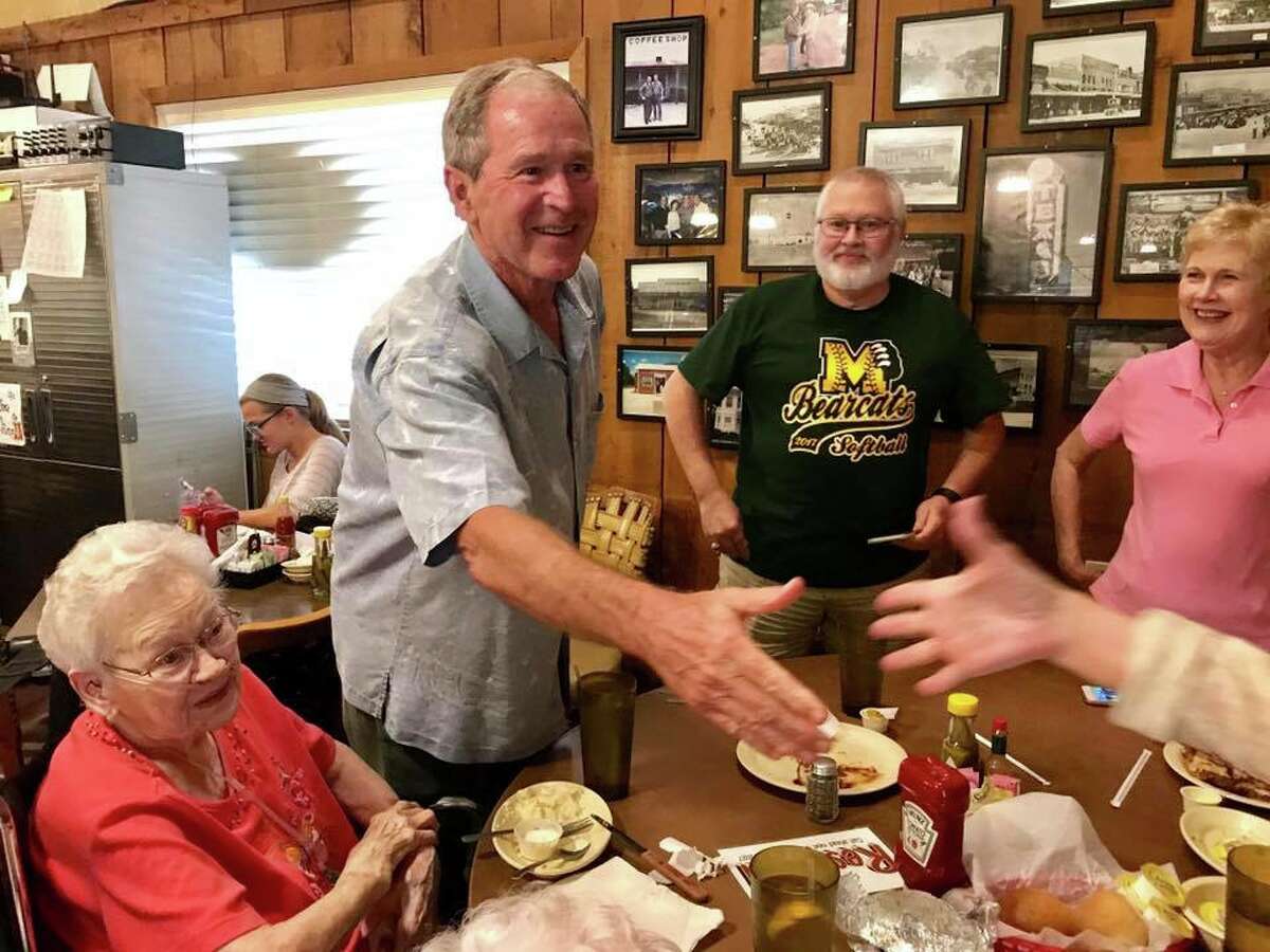 President Bush and former first lady, Laura Bush, chatted with the guests of Coffee Shop Cafe in McGregor following a surprise visit.