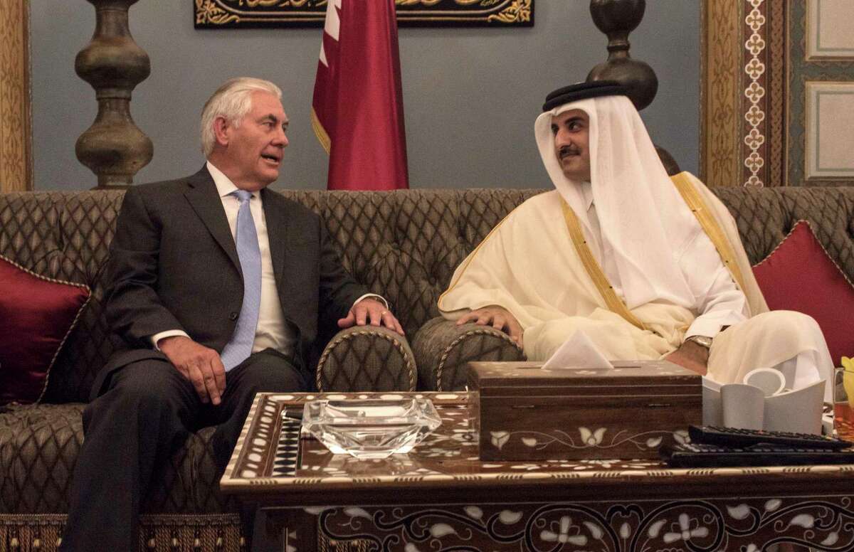 U.S. Secretary of State Rex Tillerson meets with the Emir of Qatar, Sheikh Tamim Bin Hamad Al Thani at the Sea Palace, in Doha, Qatar, Tuesday, July 11, 2017. Tillerson arrived in Qatar as he tries to mediate a dispute between the energy-rich country and its Gulf neighbors. The visit is Tillerson's second stop on a shuttle-diplomacy tour that is also expected to take him to Saudi Arabia, which shares Qatar's only land border and is the most powerful of the four countries lined up against it.(Alexander W. Riedel/US State Department via AP)