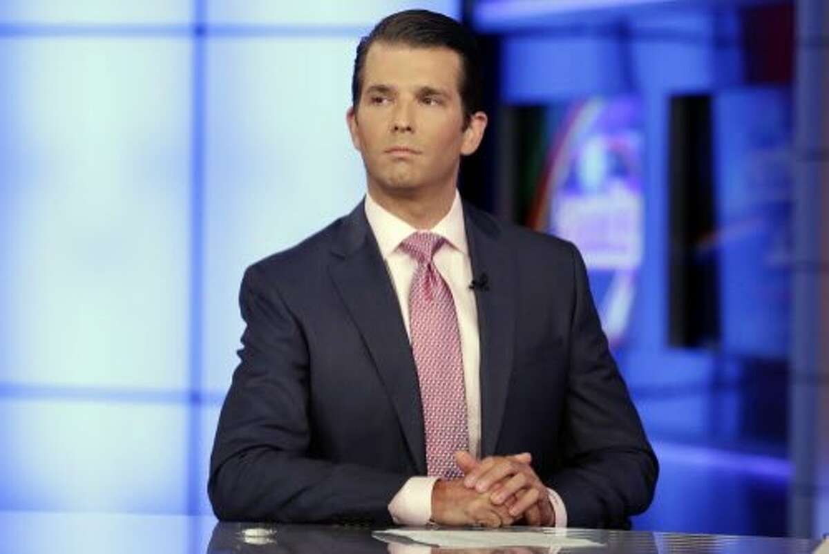 Donald Trump Jr. is interviewed by host Sean Hannity on his Fox News Channel television program, in New York Tuesday, July 11, 2017. Donald Trump Jr. eagerly accepted help from what was described to him as a Russian government effort to aid his father's campaign with damaging information about Hillary Clinton, according to emails he released publicly on Tuesday. (AP Photo/Richard Drew)