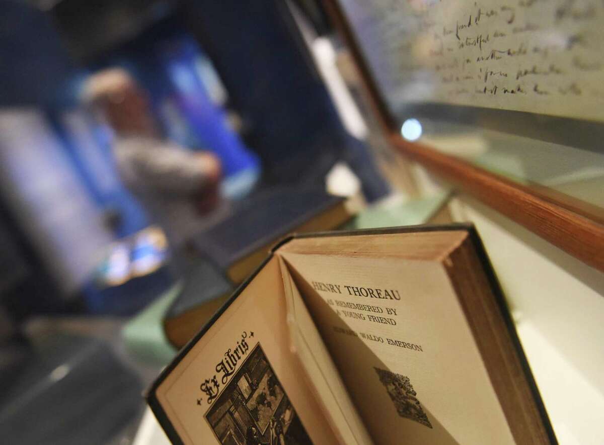 Items are displayed at the “Henry David Thoreau: A Bicentennial Celebration” exhibition at the Bruce Museum in Greenwich, Conn. Tuesday, July 11, 2017. Books, letters and a bouquet of flowers comprise the small display commemorating the bicentennial of the "Walden" author's birth, July 12, 1817. The display will remain at the Bruce Museum through the end of July.