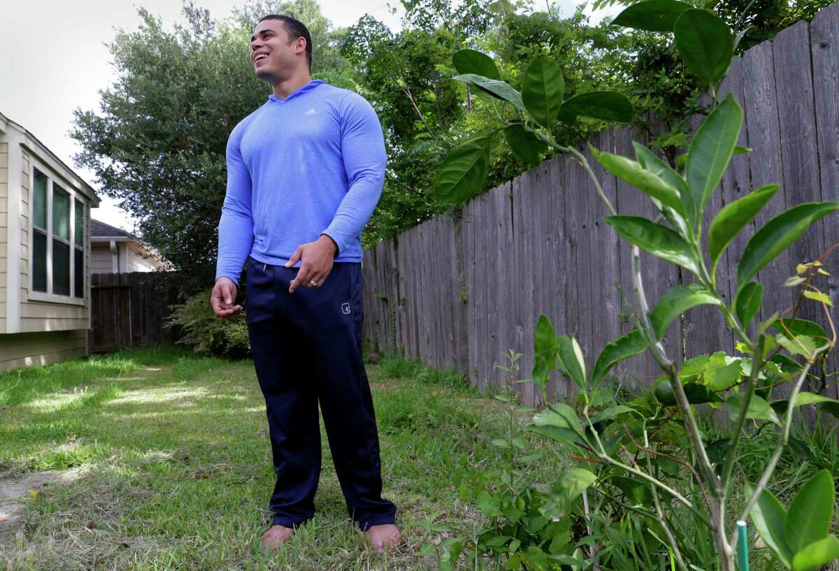 Nicholas Chrysanthou has started a fruit and vegetable garden in the backyard of his Houston home to help him cope with his many food allergies. (Michael Wyke / For the Chronicle)