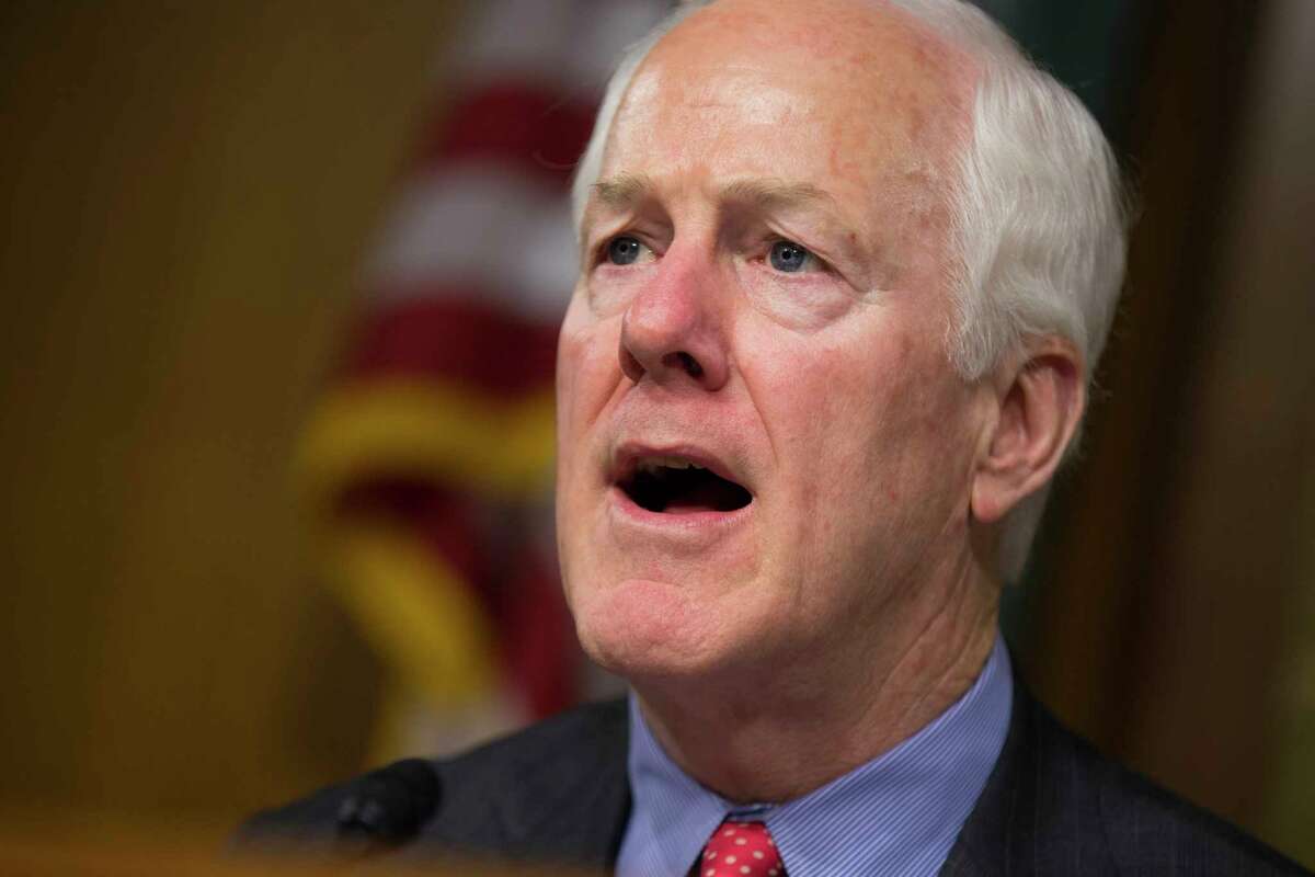 FILE - In this June 7, 2016, file photo, Sen. John Cornyn, R-Texas speaks on Capitol Hill in Washington. Congressional Democrats are warning that Speaker Paul Ryan and President-elect Donald Trump are gunning for Medicare _ and they are rubbing their hands in glee at the prospect of an epic political battle over the governmentÂ?’s flagship health program that covers 57 million Americans. It turns out that Republicans, especially in the Senate, are not spoiling for a fight. Â?“We are not inclined to lead with our chin,Â?” said Cornyn of Texas. Â?“And right now, weÂ?’ve got a lot on our plate.Â?” (AP Photo/Evan Vucci, File)