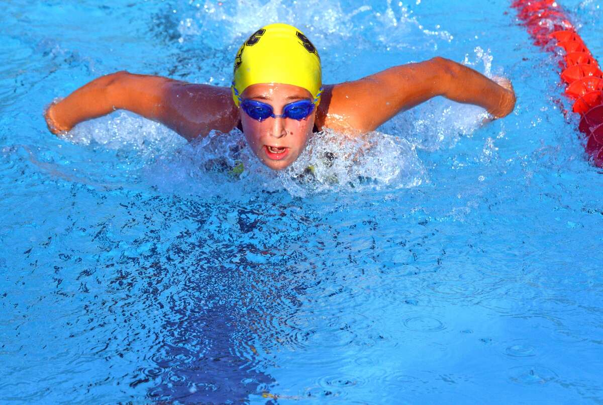 Madelyn Milburn of Sunset Hills competes in the mixed 13-14 200-meter medley relay during Tuesday’s dual meet at Water Works.