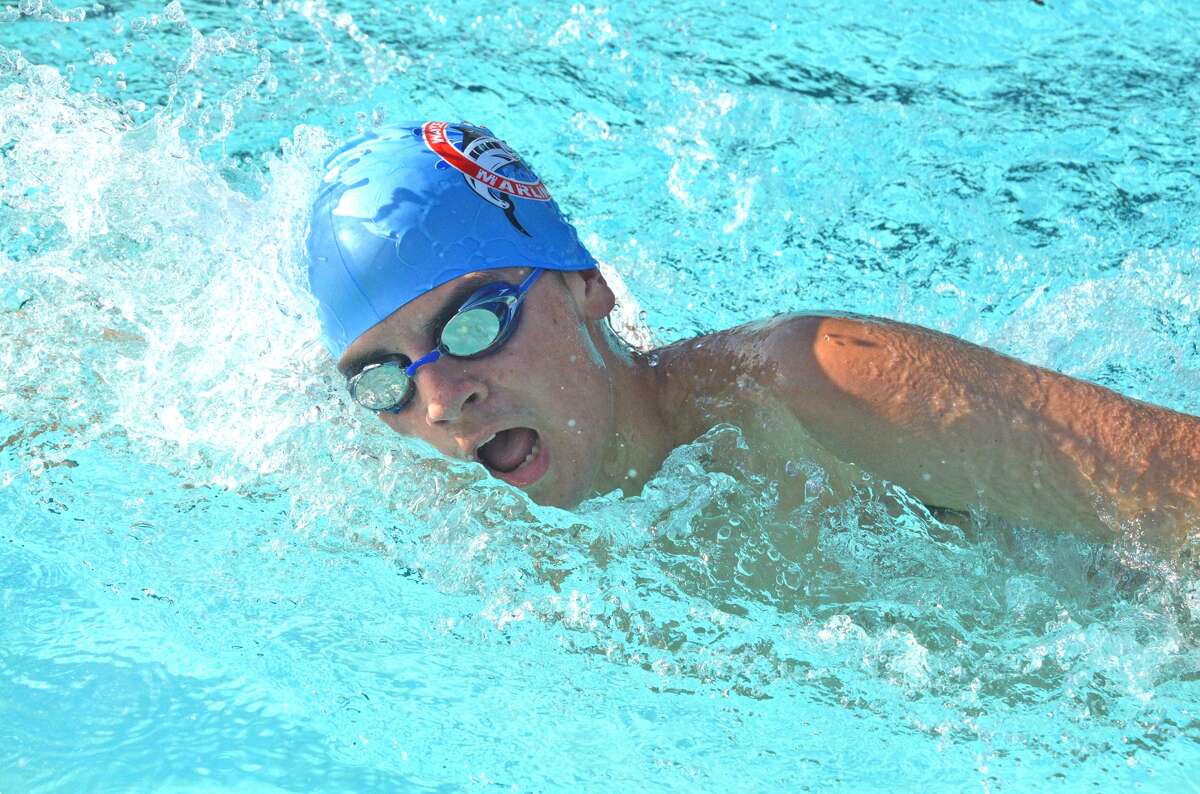 Trent Sholl of Water Works competes in the mixed 13-14 200-meter freestyle.
