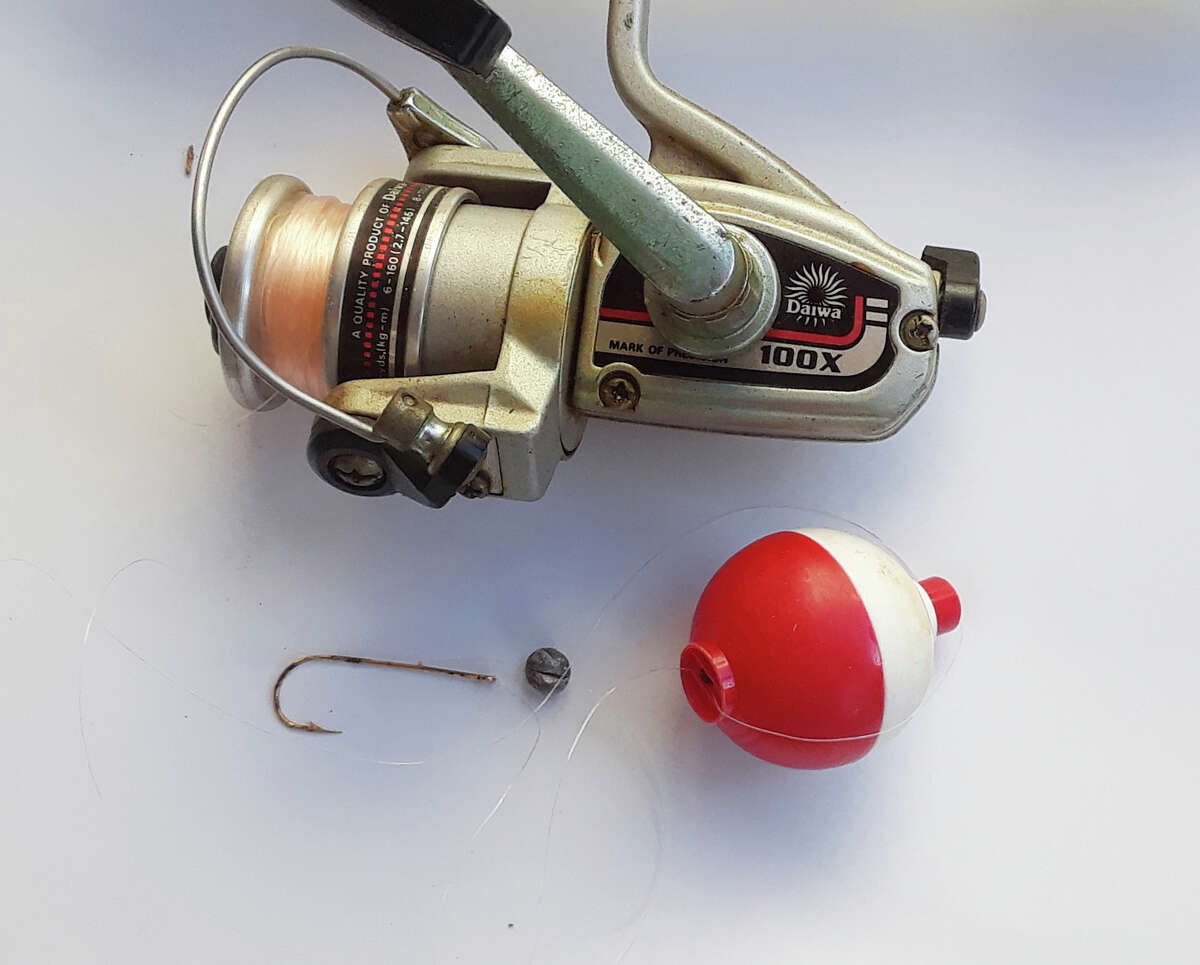 Below the reel are the rest of the rig you need to go fishing: hook, split shot and bobber.