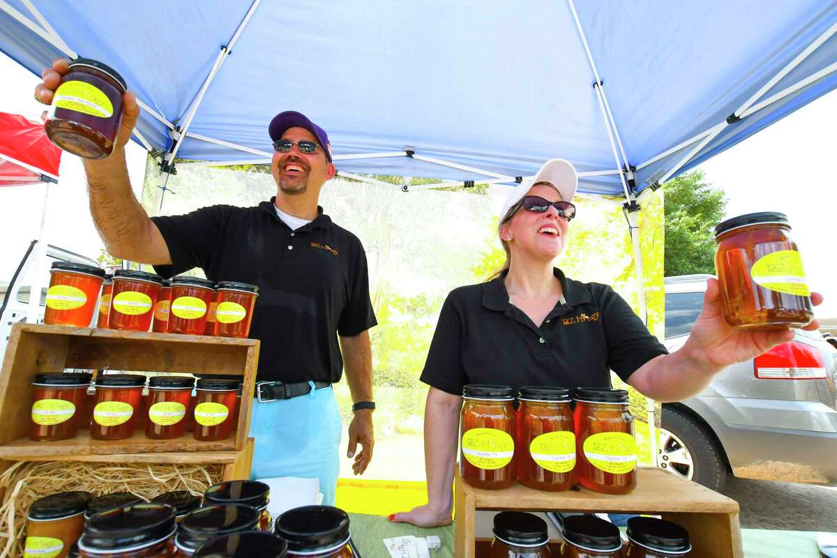Jersey Village High School math teacher Matt Brantley and wife Kelly Brantley sell their BZ Honey. The honey is from local honey and beekeeping supplies. The honey hives come from Cypress, Katy, and Tomball. The Jersey Village Farmers Market opened July 2. The market, which is held outside of City Hall at 16327 Lakeview Drive, will be held the first Sunday of each month from noon to 3 p.m.