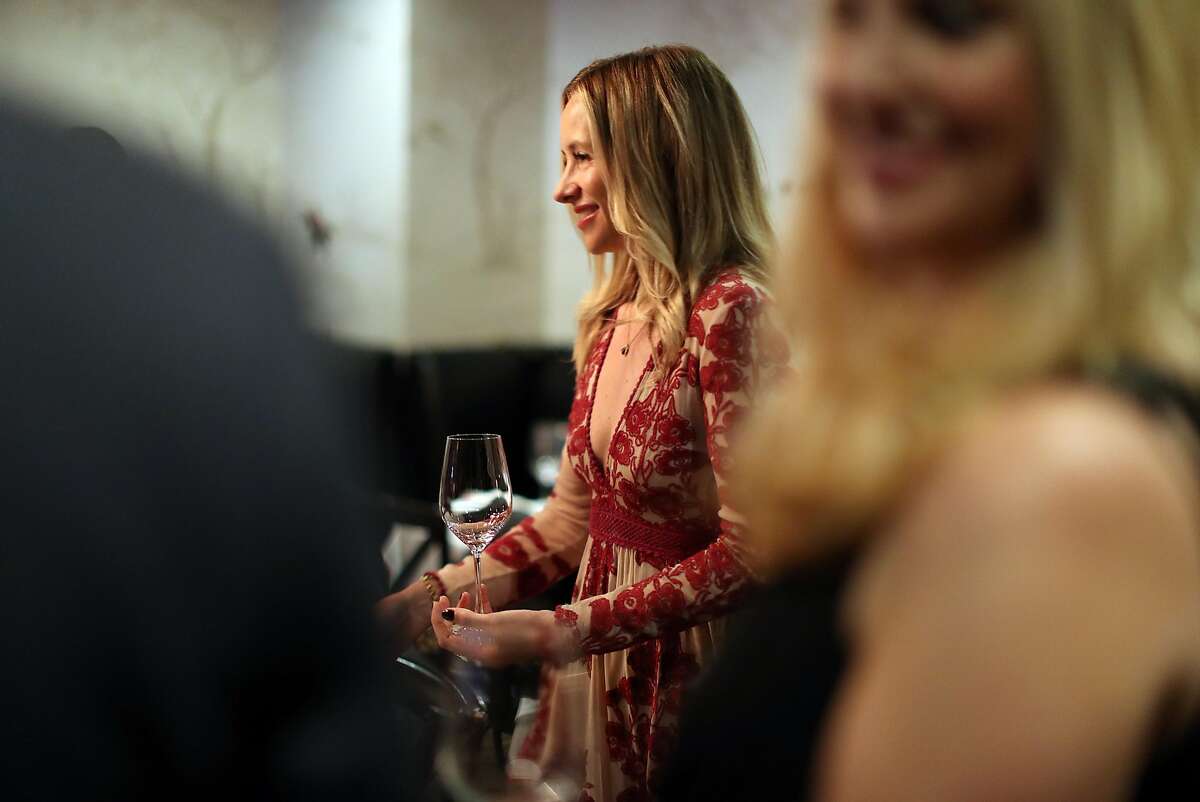 Tamsin Lonsdale welcomes diners to Supper Club at The Cavalier's "Wine Stables" room in San Francisco, Calif., on Wednesday, June 21, 2017.