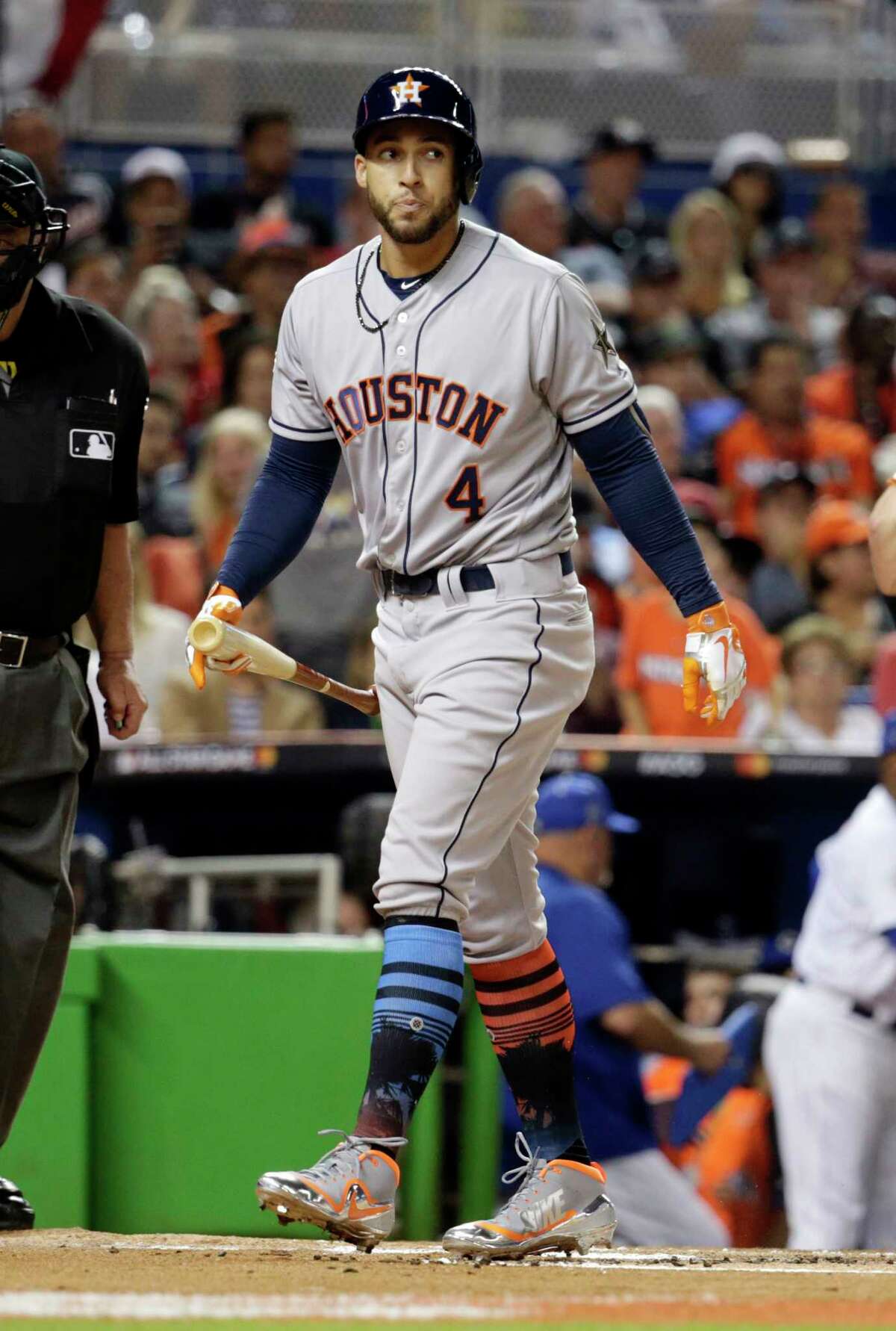 American League's Houston Astros George Springer (4) walks back to the dugout after striking out, during the first inning at the MLB baseball All-Star Game, Tuesday, July 11, 2017, in Miami. (AP Photo/Lynne Sladky)