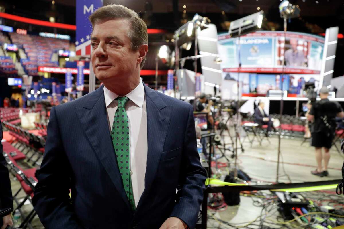In this photo taken July 17, 2016, Paul Manafort talks to reporters on the floor of the Republican National Convention at Quicken Loans Arena in Cleveland. The Senate Judiciary Committee plans to bring in Manafort for questioning of the Trump campaign and will subpoena him if necessary, the Republican chairman of the panel said Wednesday, July 12, 2017. (AP Photo/Matt Rourke)