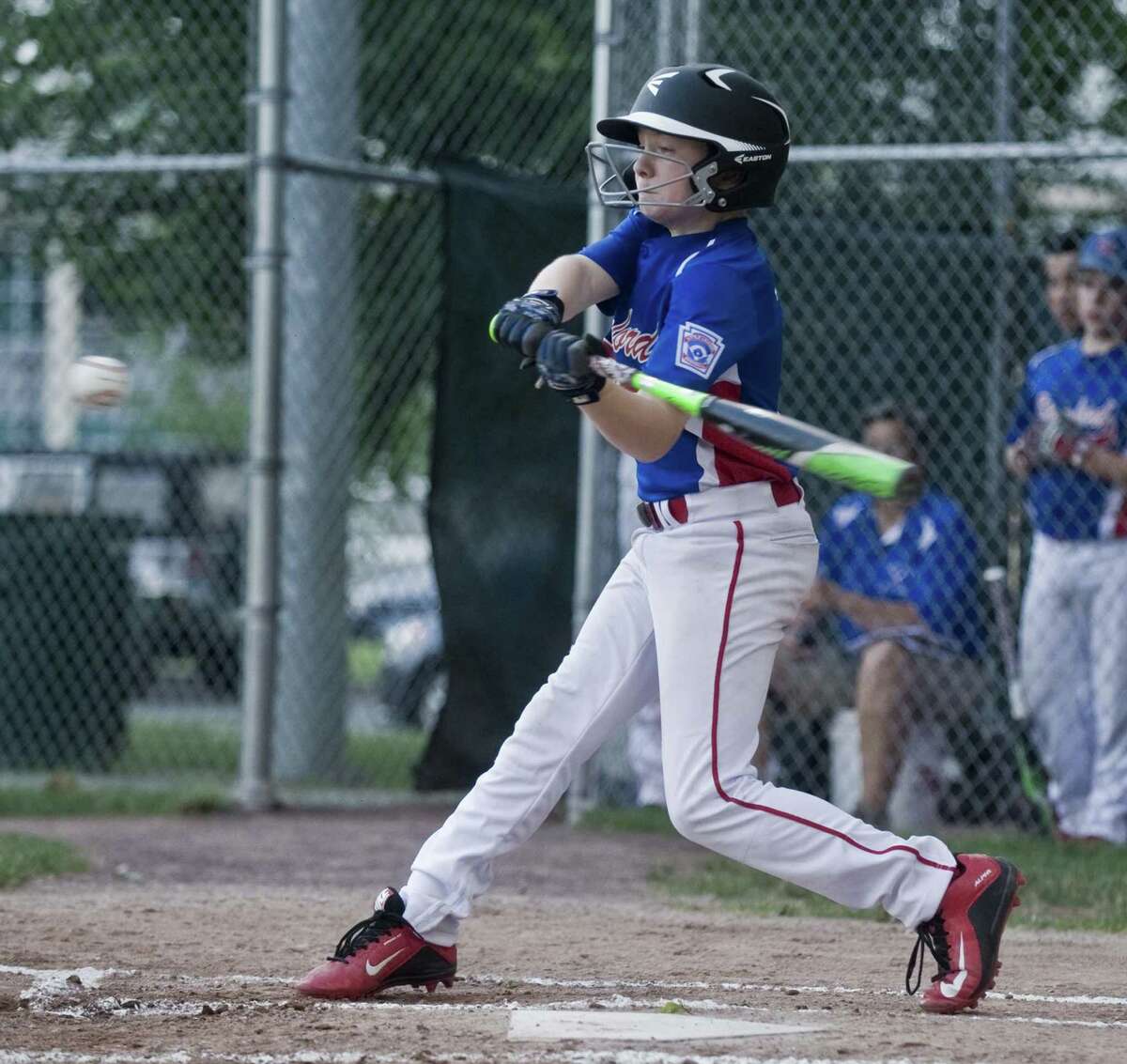 Stamford North's Miles Aquila swings at a pitch during the Little League playoffs against Wilton, played at Scalzi Park in Stamford. Wednesday, July 12, 2017
