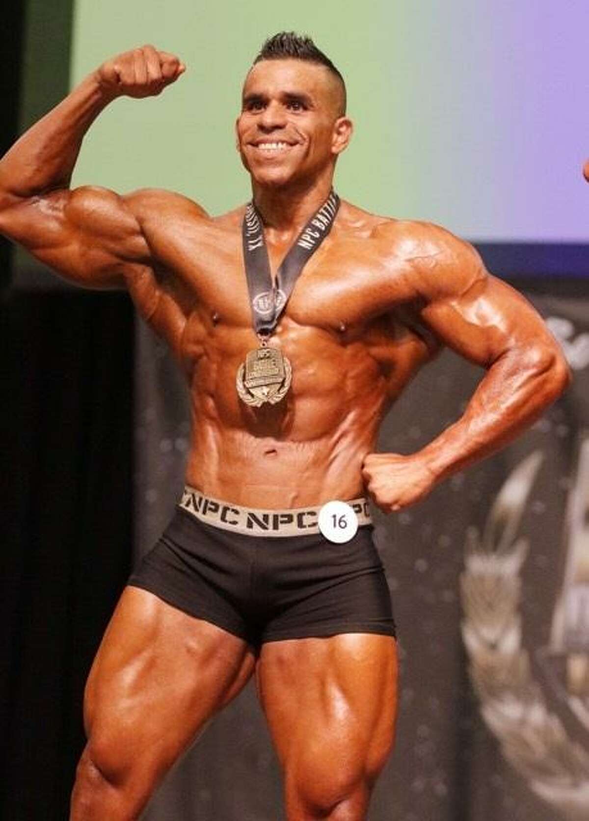 Jerry "Flex" Aguilar celebrates from winning classic physique last year at the Battle on the Bay. Aguilar impressed again in Corpus Christi as the Laredoan won the men's open light heavyweight division at the 2017 NPC Battle on the Bay.