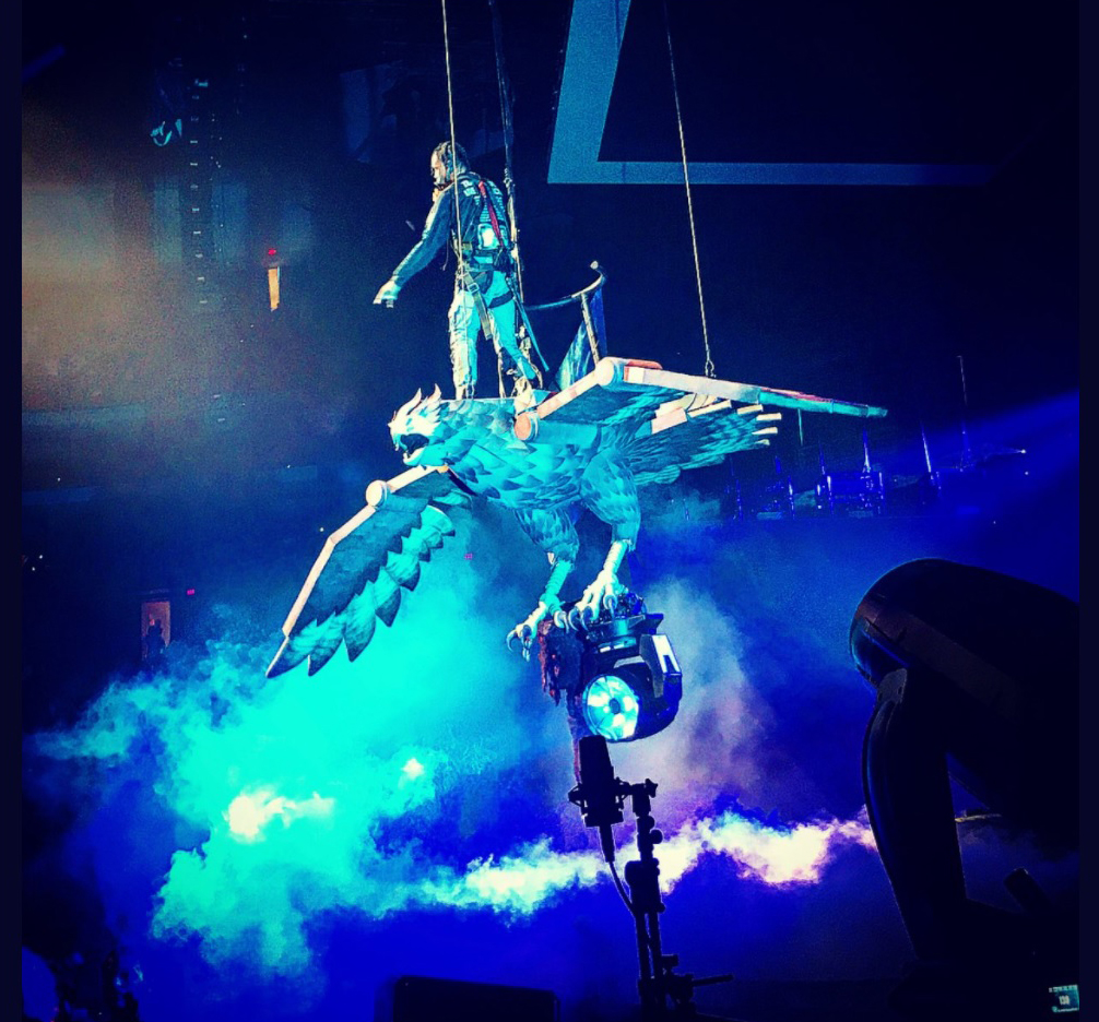 Watch Travis Scott fly atop a mechanical bird at tour kickoff