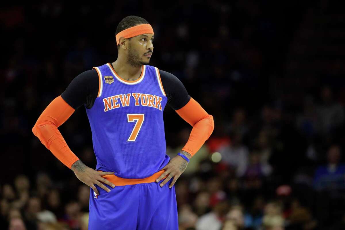 FILE - In this March 3, 2017, file photo, New York Knicks' Carmelo Anthony is shown during an NBA basketball game against the Philadelphia 76ers, in Philadelphia. The New York Knicks and Houston Rockets continue talking about a trade for Carmelo Anthony, though a person with knowledge of the details says no deal is imminent. Anthony has told the Knicks he would accept a move to the Rockets but the teams are still trying to find a trade that works for both sides, the person told The Associated Press on Thursday, July 13, 2017. (AP Photo/Matt Slocum, File)