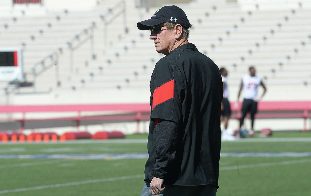 Lamar's new head coach Mike Schultz observes the players as they run drills on the opening day of spring practice Tuesday at Provost Umphrey Stadium Tuesday. Photo taken Tuesday, March 21, 2017 Kim Brent/The Enterprise