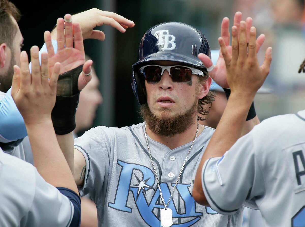 Tampa Bay Rays' Colby Rasmus celebrates after scoring against the Detroit Tigers during the fifth inning of a baseball game Saturday, June 17, 2017, in Detroit. (AP Photo/Duane Burleson)