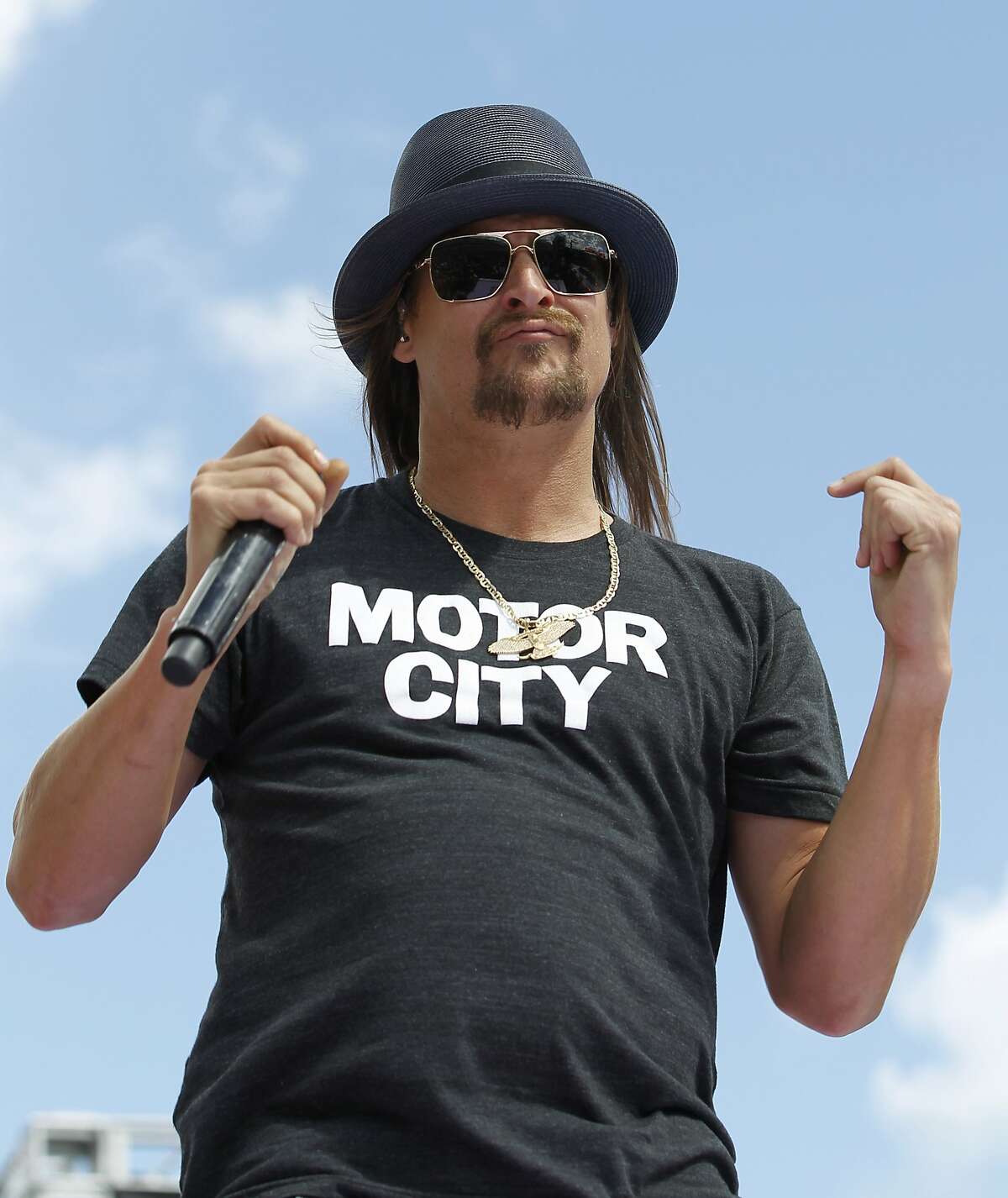 FILE - In this Feb. 22, 2015 file photo, Kid Rock performs before the Daytona 500 NASCAR Sprint Cup series auto race at Daytona International Speedway in Daytona Beach, Fla. The musician from suburban Detroit is teasing his potential 2018 U.S. Senate candidacy, though it is news to Michigan Republicans. Kid Rock, who was born Robert Ritchie, said Wednesday, July 12, 2017, that a website hinting at his campaign �www.kidrockforsenate.com � is legit. (AP Photo/Terry Renna, File)