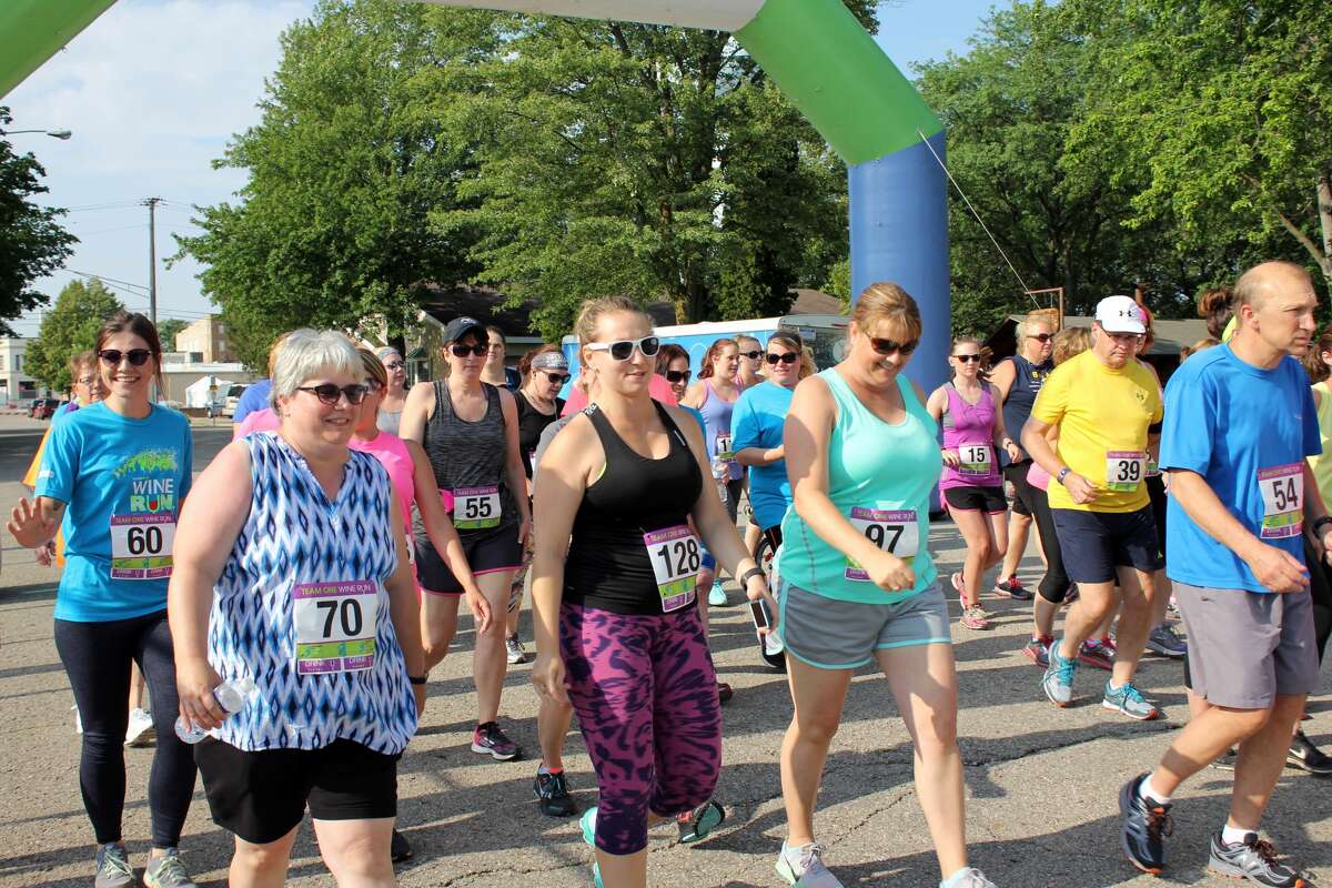 Dozens of runners and walkers participated in the TOCU Tri to Finish Wine Run/Walk 5K Thursday evening in Bad Axe City Park. Proceeds went to the Bad Axe Soccer Association.