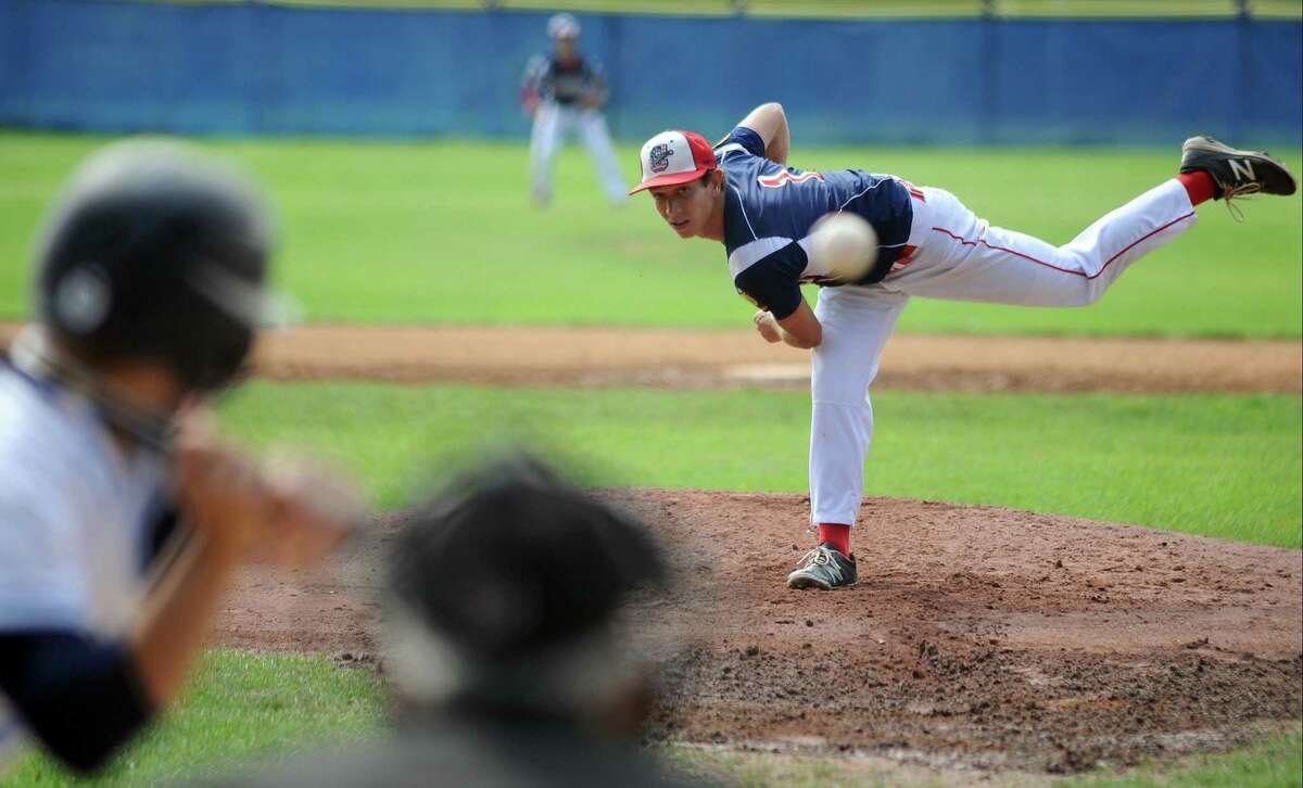 Greenwich Cannons pitcher Anthony Ferraro pitches against Stamford’s Anthony Frangiose during a game on July. Ferraro and the Cannon posted a 23-2 record to win Zone 4.