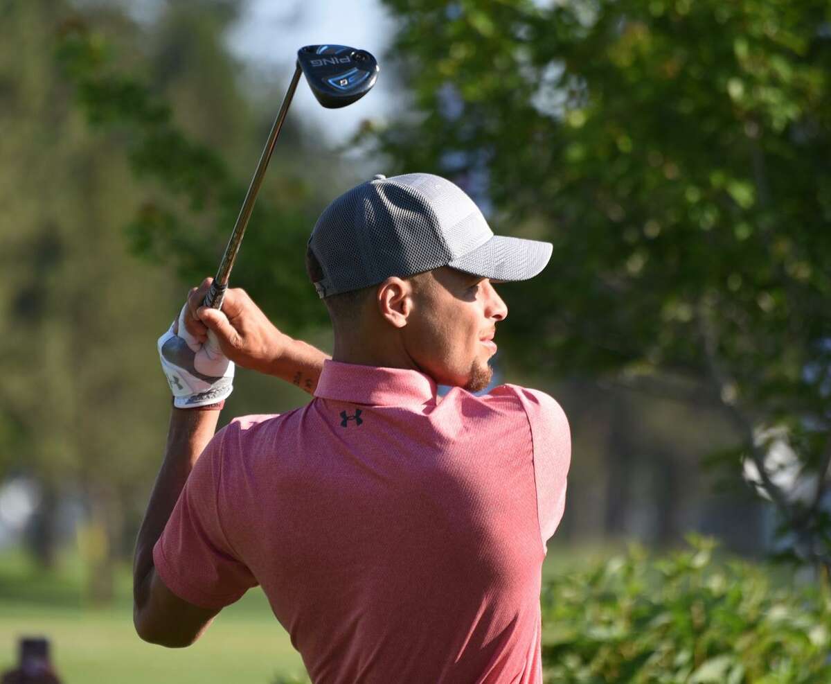 Stephen Curry tees off during a practice round ahead of the this weekend’s celebrity tournament. He and his dad have a bet on the event in which one of them will end up wet.