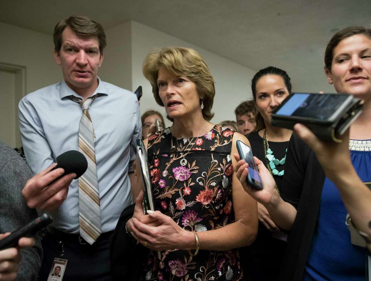 Sen. Lisa Murkowski, R-Alaska, and other lawmakers, head to the Senate on Capitol Hill in Washington, Thursday, July 13, 2017, for a meeting on the revised Republican health care bill which has been under attack from within the party, including by Murkowski. (AP Photo/J. Scott Applewhite)
