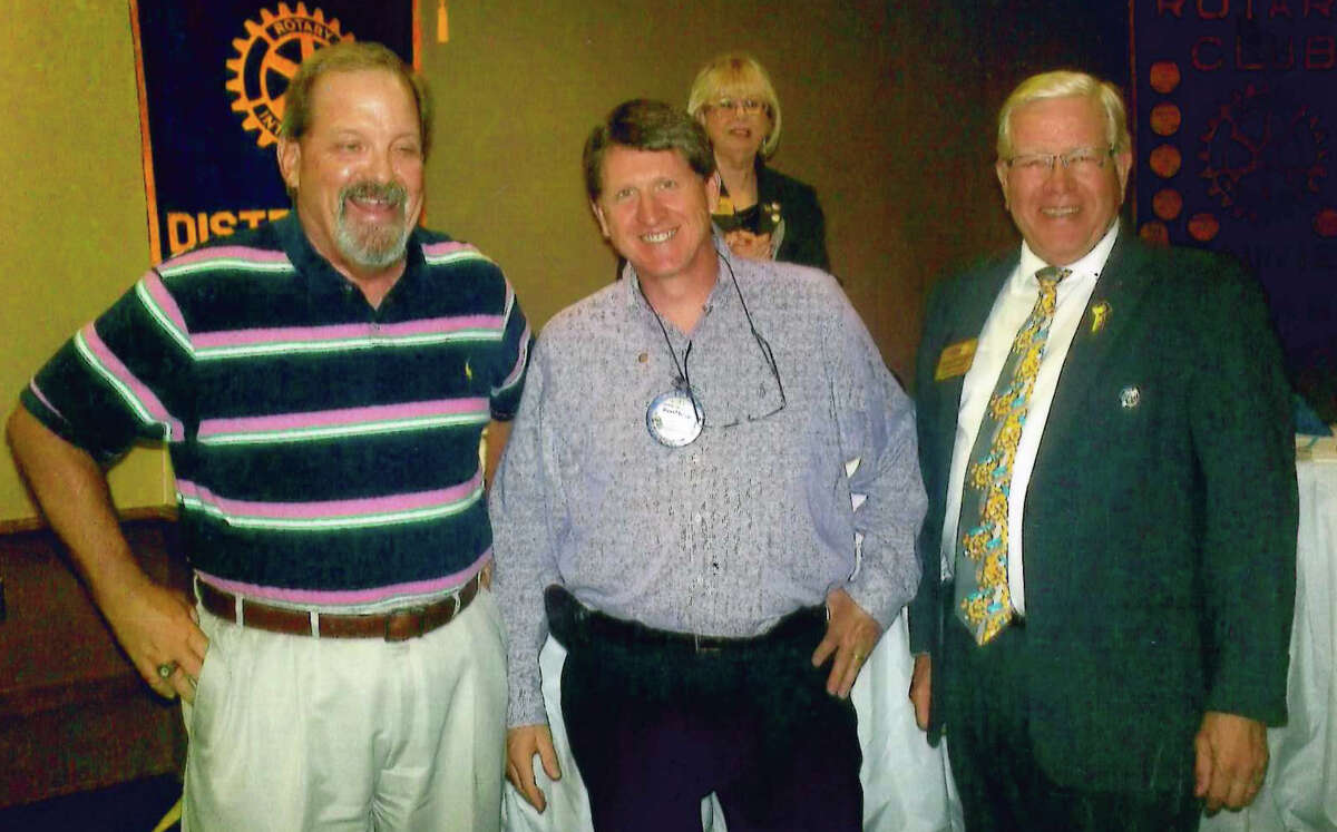 Rotary District Gov. Charles Starnes (right) presented Paul Harris Fellowships to Ross Owen (left) and David Kopp during Tuesday’s meeting