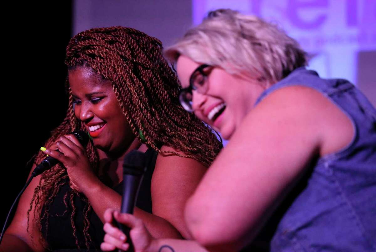 Podcast co-host Stacey Daniels, right, and guest Kam Franklin from The Suffers react to a joke they said during a live comedy show at the Rec Room Friday, March 31, 2017, in Houston. ( Yi-Chin Lee / Houston Chronicle )