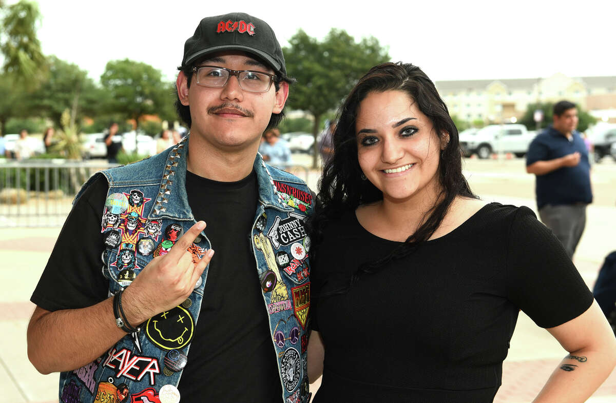 Ricky Carraman and Jackie Guerra at the Laredo Energy Arena for the Journey concert.