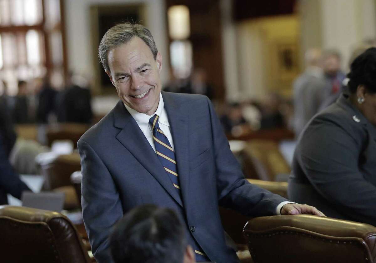 Texas Speaker of the House Joe Straus, R-San Antonio, talks with fellow lawmakers on the House floor April 19 at the Texas Capitol in Austin. The speaker fills a void of real leadership in Texas.