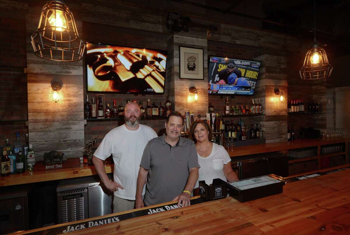 Bobby Q's restaurant chef Ole Knudsen and owners, Robert and Kelly Lerose, at their new location Friday, July 14, 2017, at 11 Merwin St. in Norwalk, Conn. The at BBQ joint which closed in Westport six months ago will be reopening next week in Norwalk.
