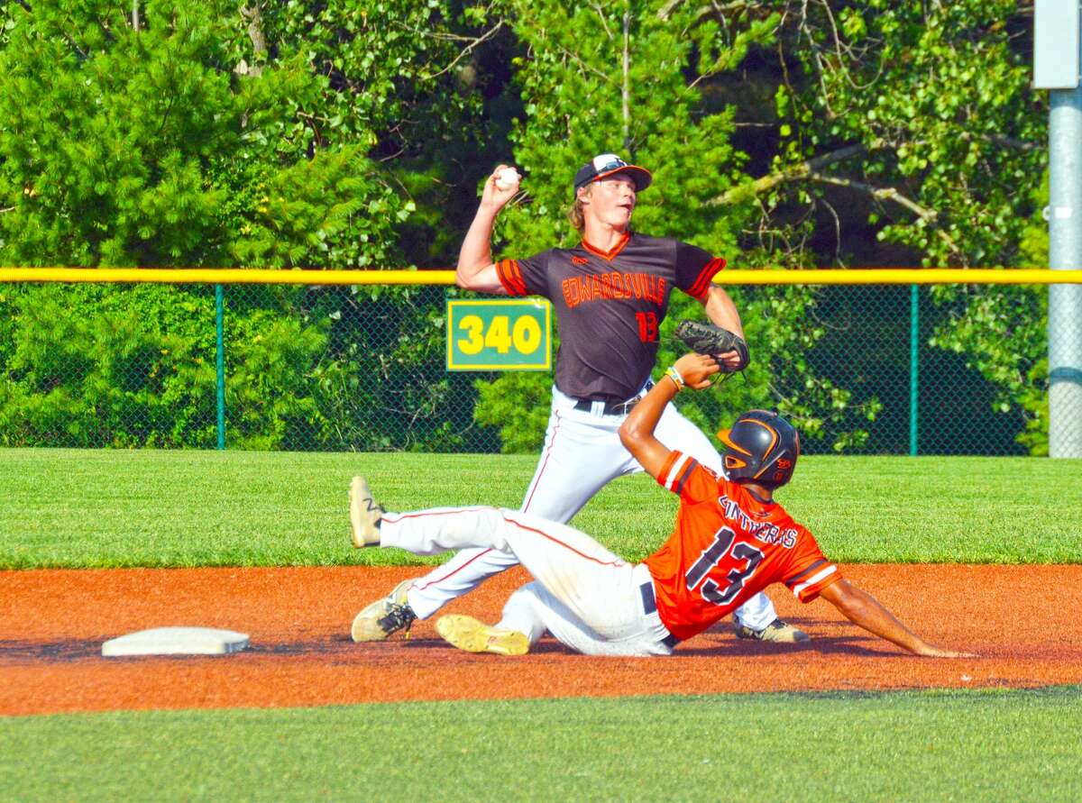 Edwardsville shortstop Jonathon Yancik fires a throw to first to try and complete a double play during Friday’s game against the BTL Hornets on the junior varsity field.