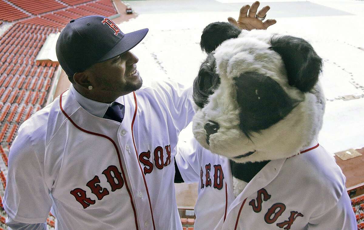 Boston Red Sox's Pablo Sandoval blows a bubble during the ninth