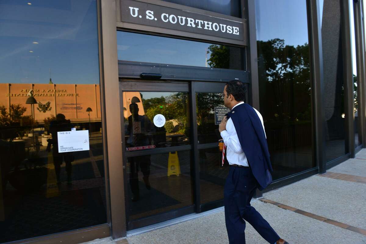 Congressman Will Hurd walks into the federal courthouse Saturday morning to give testimony in a redistricting trial.